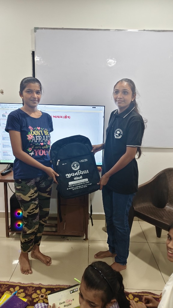 Mentors distributing academic kits to students